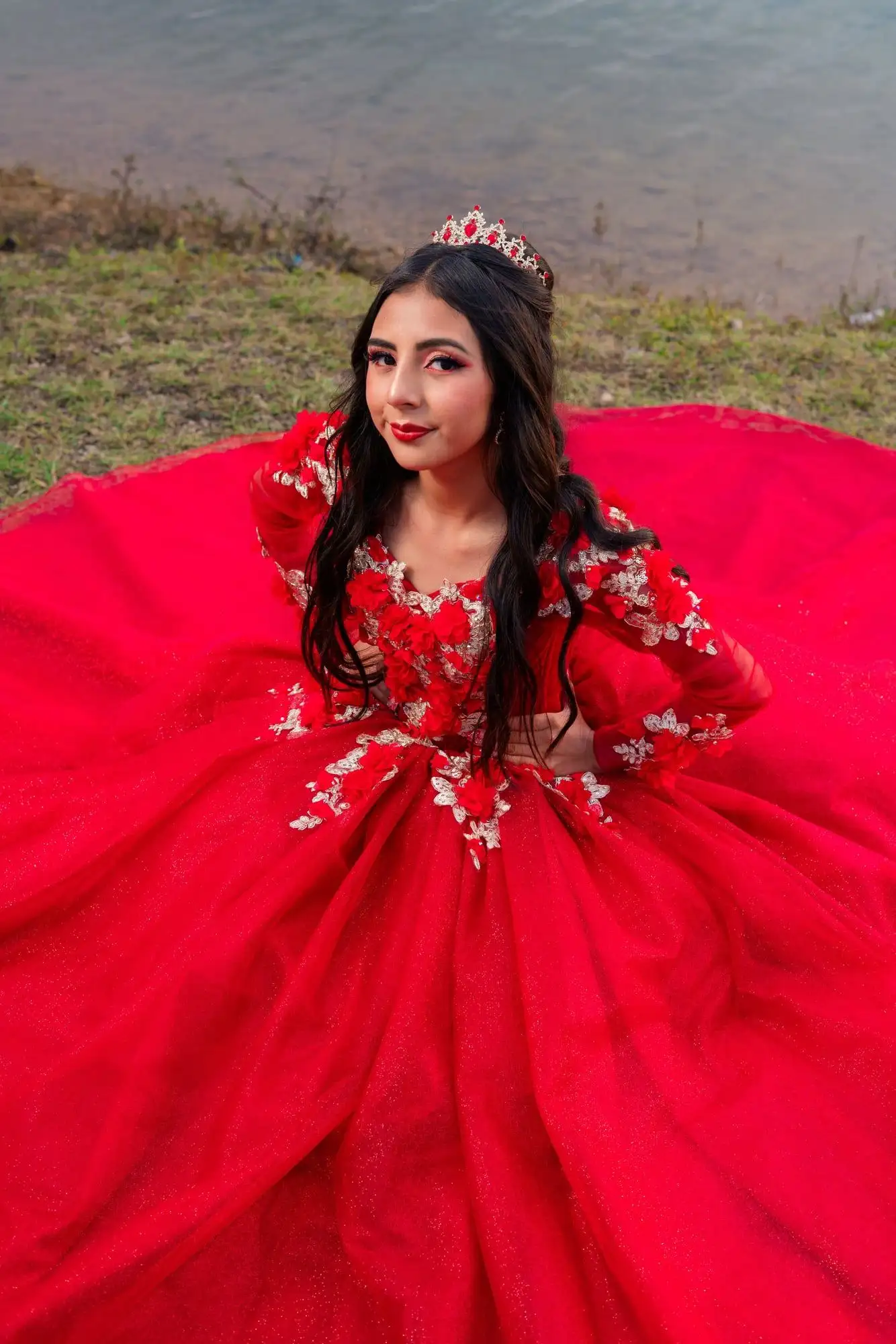 A quinceañera in a full ball gown